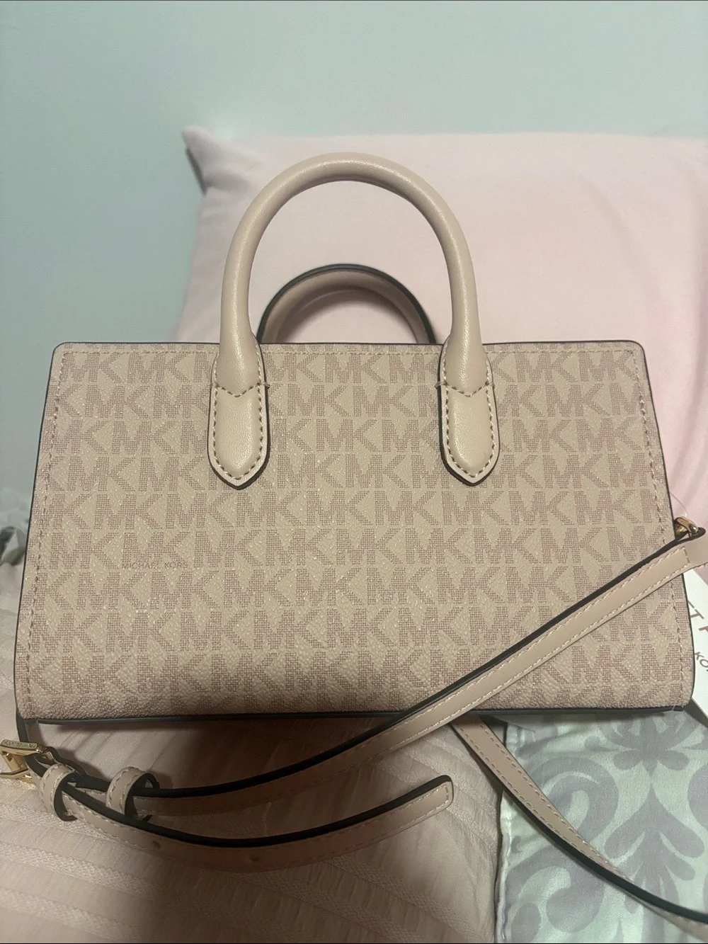 A cute MICHAEL KORS Blush Pink Logo Satchel with Floral Charm